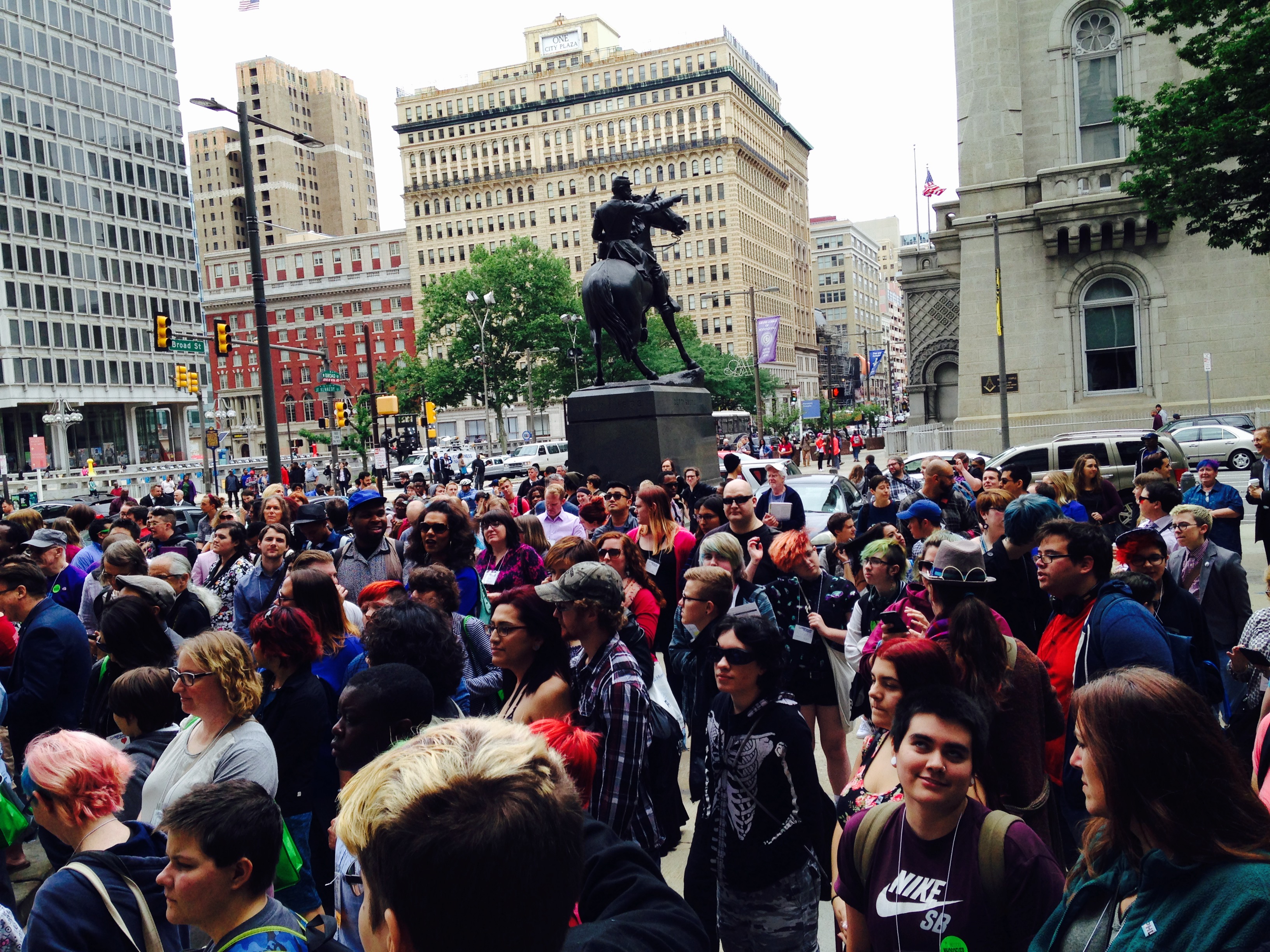 A crowd gathering for the flying of the transgender flag in Philadelphia, PA