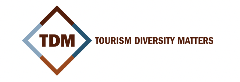 Tourism Diversity Matters logo, a diamond in gray and brown with TDM in the center