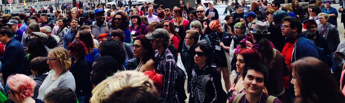 A crowd gathering for the flying of the transgender flag in Philadelphia, PA