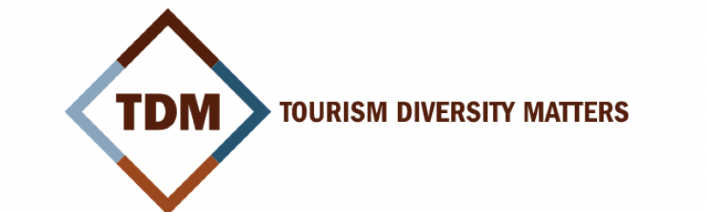 Tourism Diversity Matters logo, a diamond in gray and brown with TDM in the center